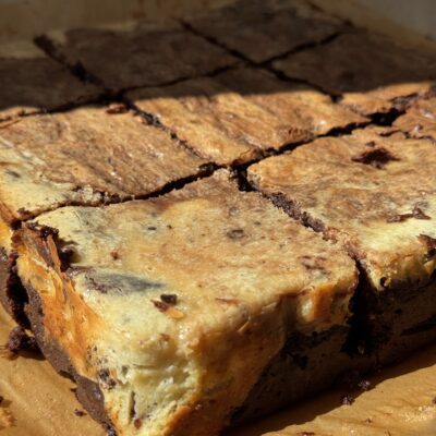 Square slices of the cheesecake chocolate brownie